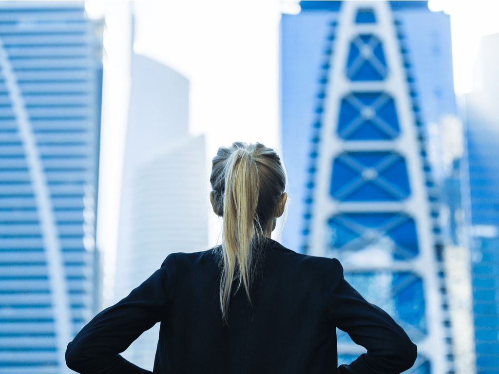 Woman power posing at city